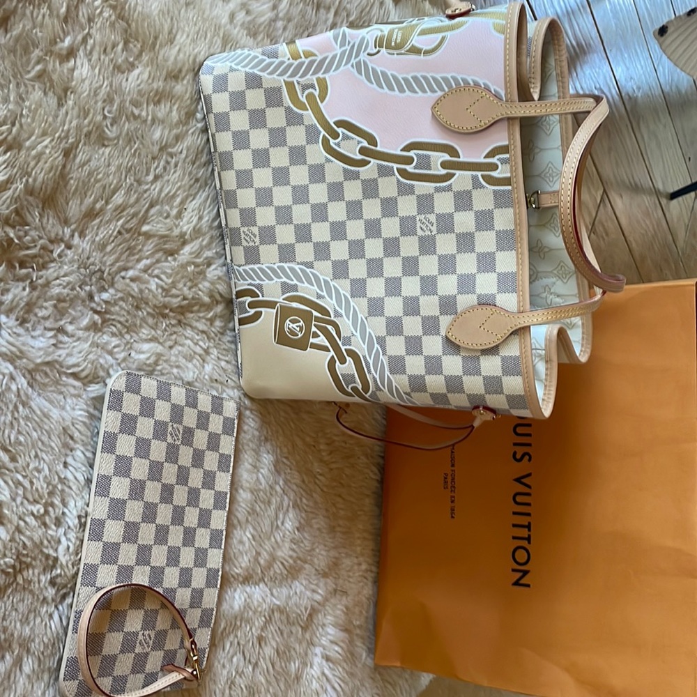 Brand new never been used genuine Louis Vuitton tote and clutch